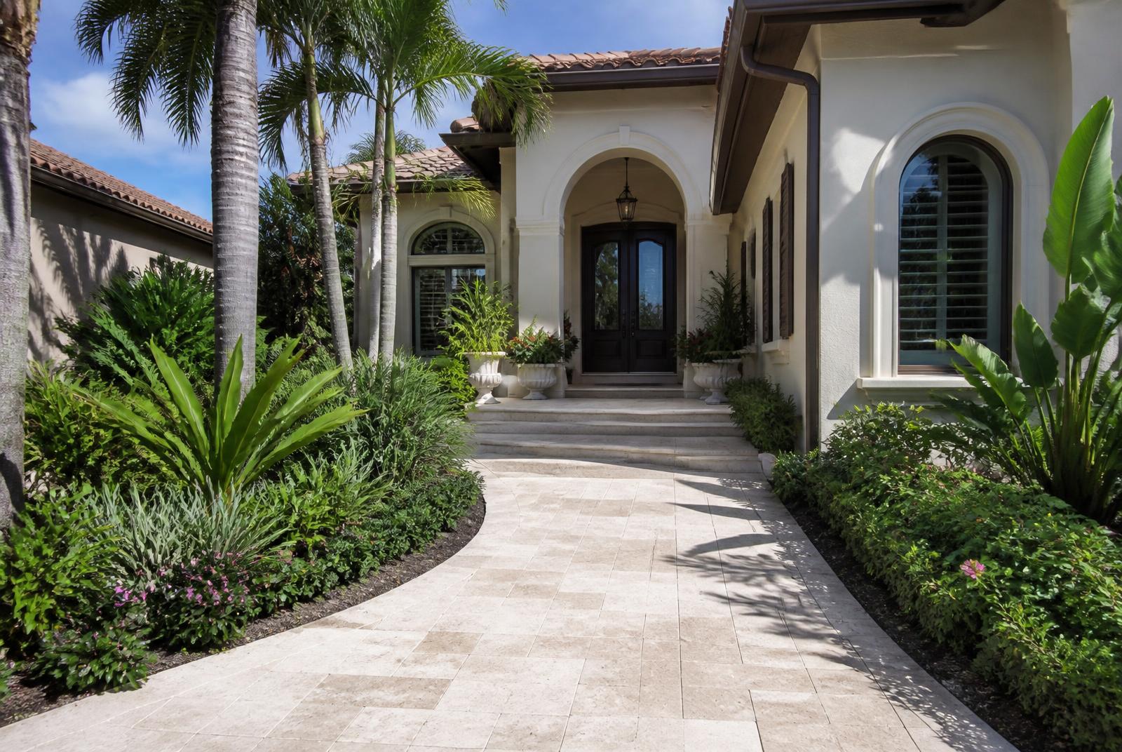 Travertine entry walkway and landing at a Palm Harbor, FL home