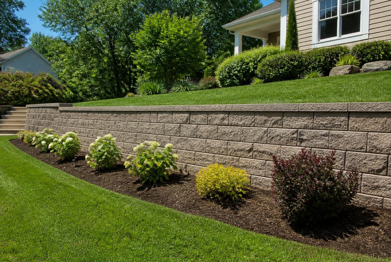 Rebuilt retaining wall replacing a failed leaning wall in Windham, NH